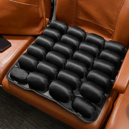 Travel cushion on a leather seat